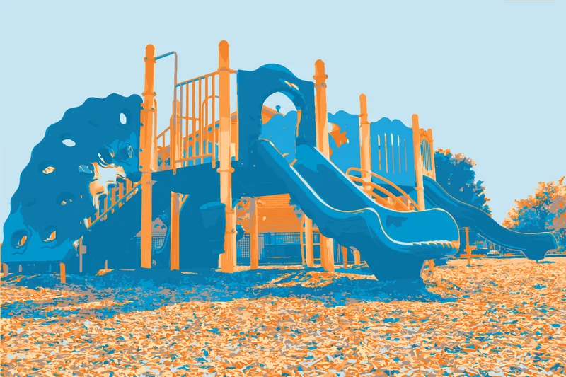 Blue and orange playground structure with slides