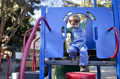 Child on playground equipment